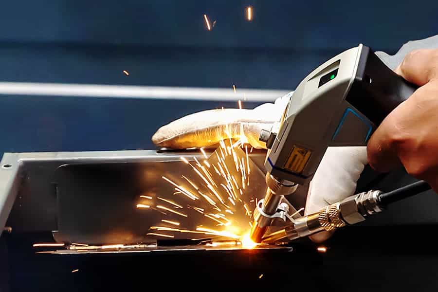laser welding machine is welding metal